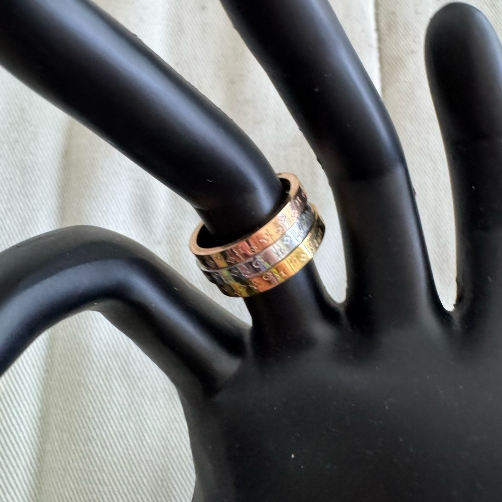 Three Gold and Silver and CopperTone Rings